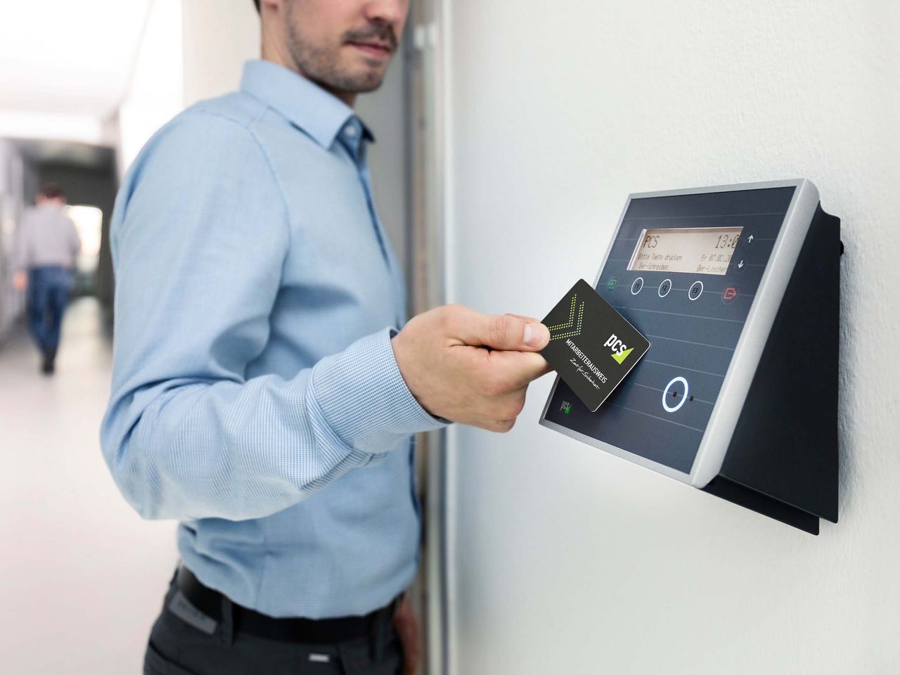 Badge access control reader at a secured door